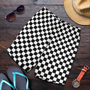 Custom personalized men's racing shorts with black and white checkered flag pattern for track day motorsports fans.