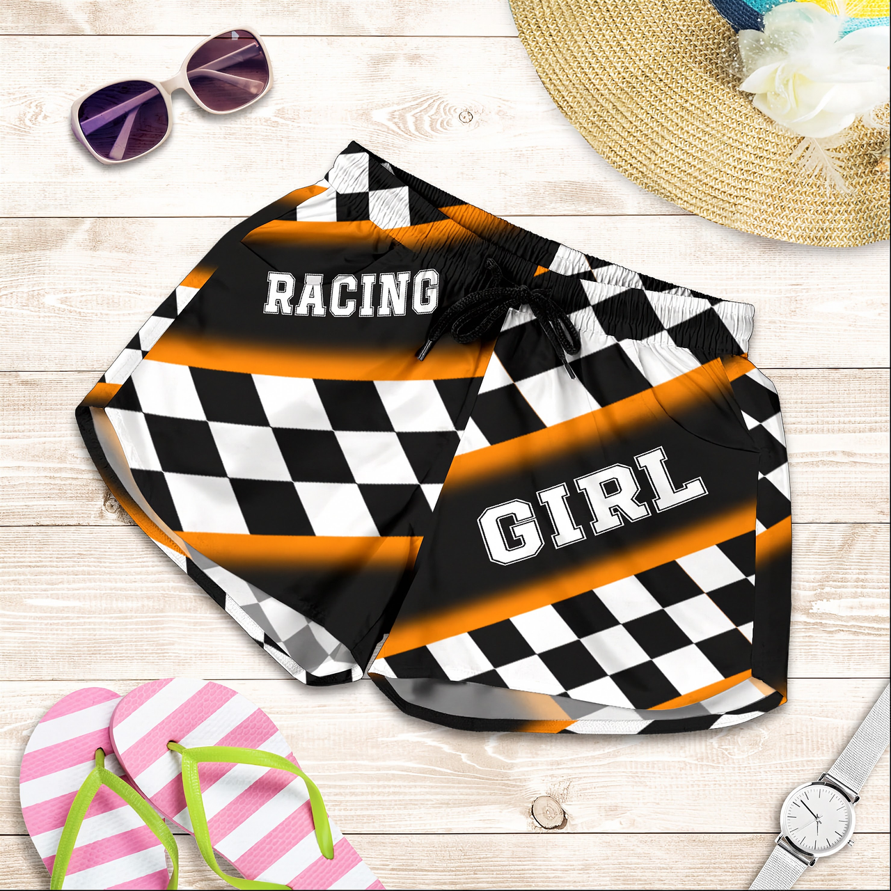 Custom personalized women's orange racing shorts featuring a high-visibility black and orange checkered pattern for trackside motorsports fans.
