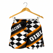 Custom personalized women's orange racing shorts featuring a high-visibility black and orange checkered pattern for trackside motorsports fans.