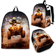 Custom personalized quad ATV backpack for kids featuring an off-road four-wheeler leaping over a muddy jump for back to school gear.