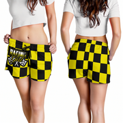 Custom personalized women's yellow racing shorts featuring a bold black and yellow checkered pattern for trackside motorsports fans.