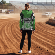 woman wearing a green racing jacket on a dirt track