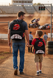 A striking red custom racing backpack displaying a high-action graphic of a winged sprint car, equipped with thick padded black ergonomic shoulder straps and a front zippered utility pocket, isolated on a stark white background.