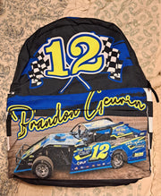 A checkered backpack with a racing theme, featuring a large main compartment and a front utility pocket. The backpack is custom-made with a blue and black checkered pattern and has a graphic of a racing car with the number 12 and the name 'Brandon Geurin'.