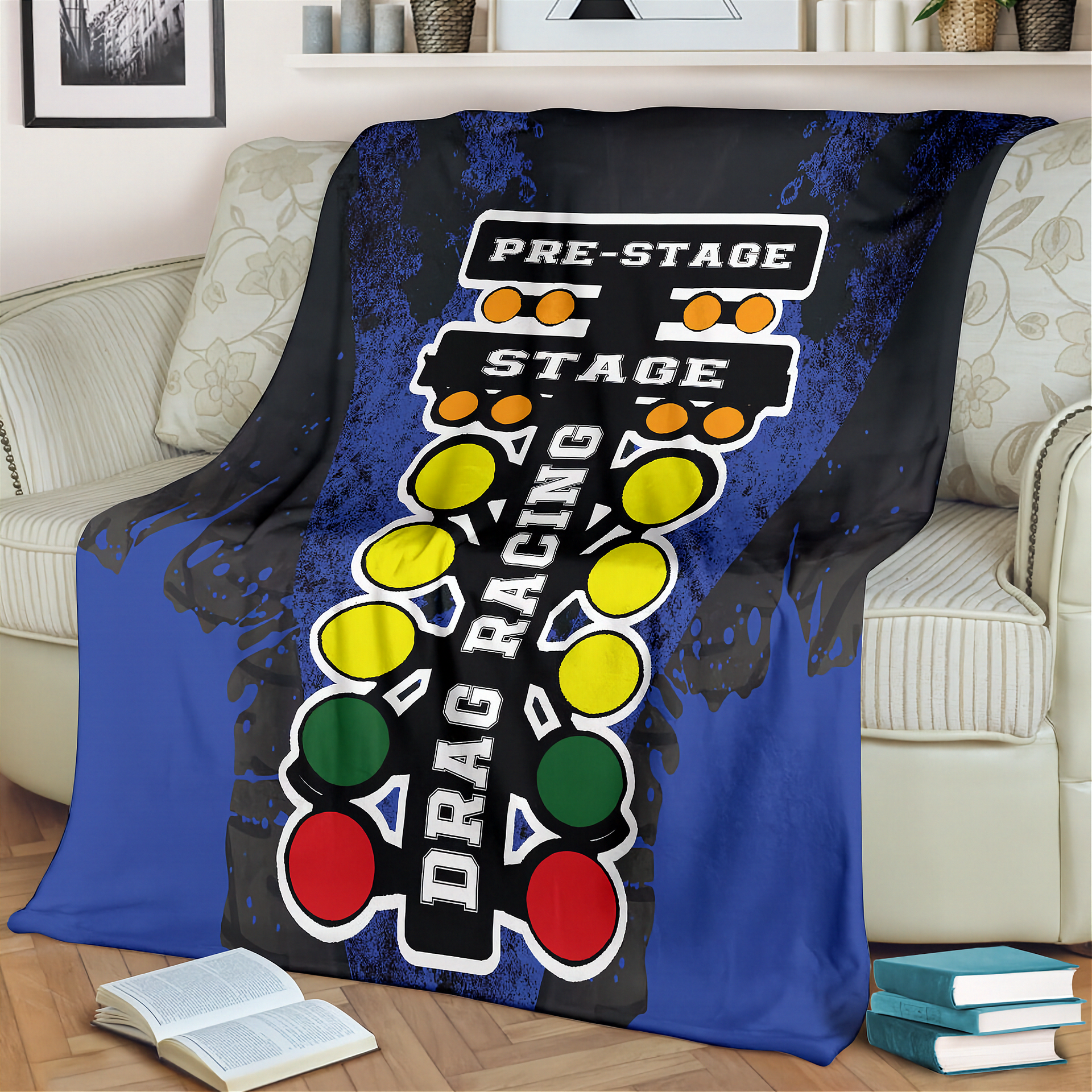Drag racing themed blanket draped over a couch in a living room setting