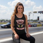 A premium black cotton crewneck t-shirt featuring the funny quote "Warning May Start Talking About Drag Racing" printed in bold white and high-visibility yellow typography, isolated flat on a solid white background.