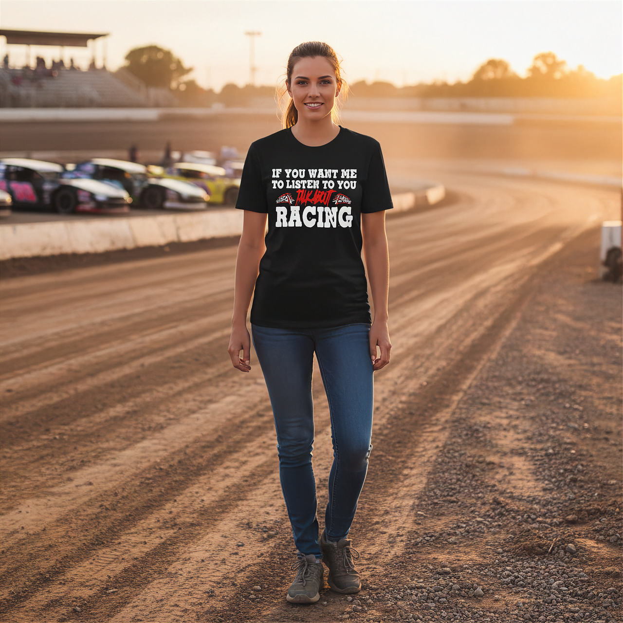 Woman wearing a black t-shirt with racing-themed text on a race track.