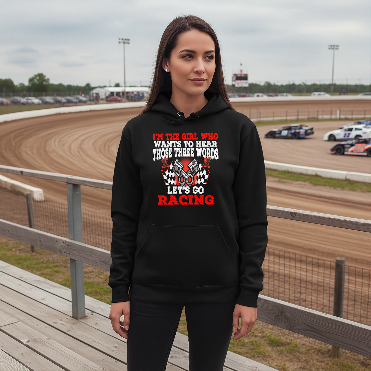 Women's racing t-shirt featuring the funny quote I'm The Girl Who Wants To Hear Those Three Words Let's Go Racing for car enthusiasts and speedway fans.