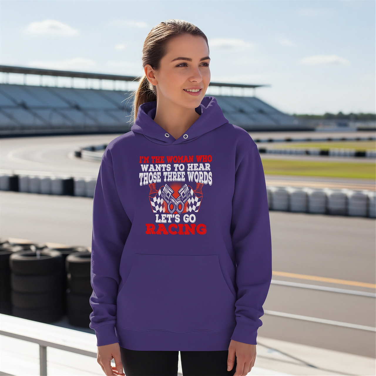Women's racing apparel featuring the funny quote I'm The Woman Who Wants To Hear Those Three Words Let's Go Racing for car enthusiasts and speedway fans.