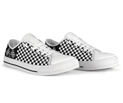Pair of checkered shoes on a white background