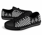 Black sneakers with checkered pattern and flag design on a white background