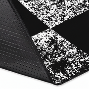 Black and white textured fabric with a patterned border