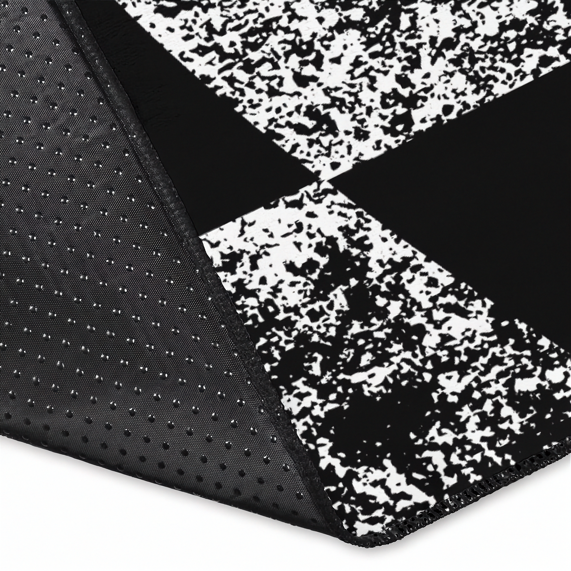 Black and white textured fabric with a patterned border