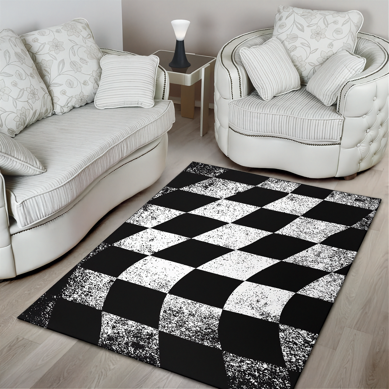 Living room with a checkered black and white rug, sofa, and armchair.