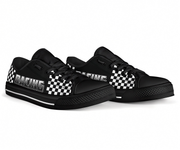 Black low top shoes with checkered patterns and 'RACING' text on a white background