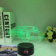 1963 Corvette C2 3D LED Illusion Lamp showing the classic Sting Ray silhouette in a vibrant blue glow on a premium black base.