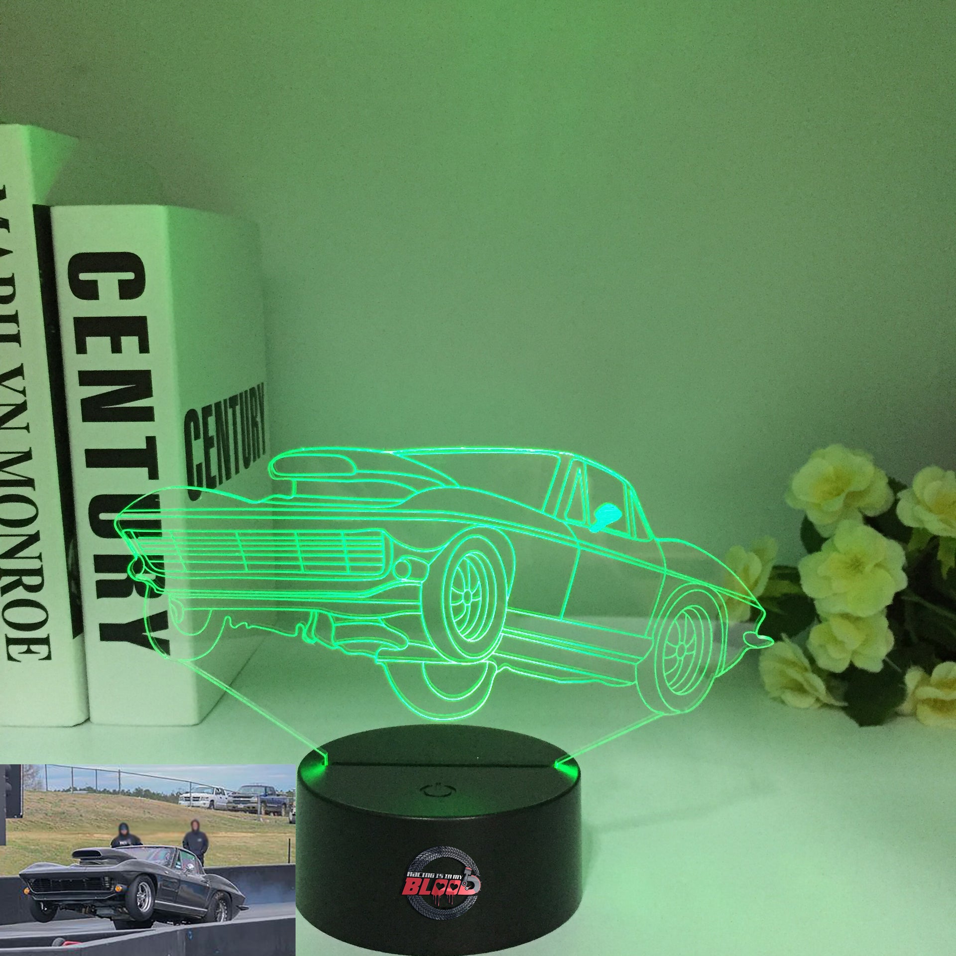 1963 Corvette C2 3D LED Illusion Lamp showing the classic Sting Ray silhouette in a vibrant blue glow on a premium black base.