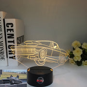 1963 Corvette C2 3D LED Illusion Lamp showing the classic Sting Ray silhouette in a vibrant blue glow on a premium black base.