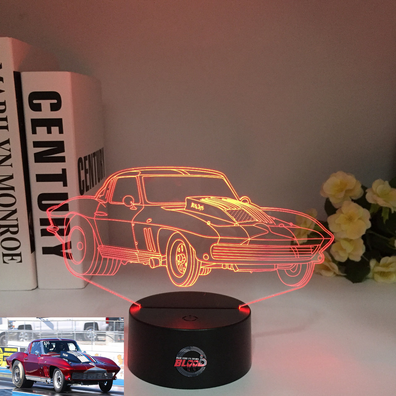 1963 Corvette Split Window 3D LED Illusion Lamp displaying the iconic Sting Ray silhouette in a vibrant red glow on a premium black base.