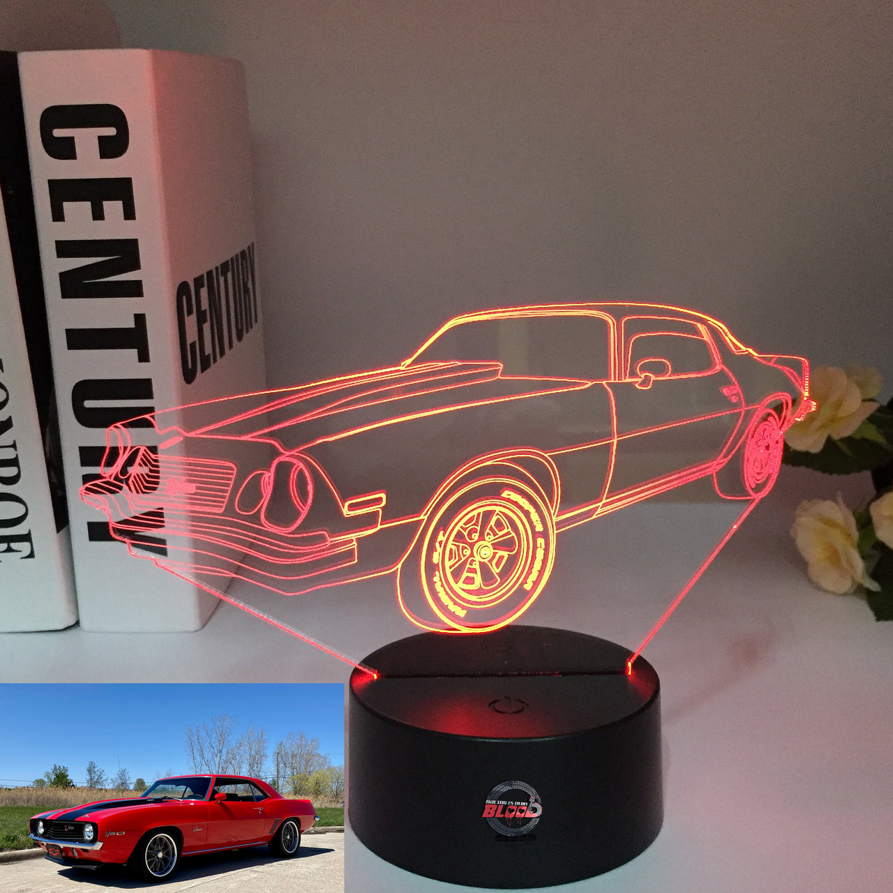 1969 Camaro Z/28 3D LED Illusion Lamp showing the classic muscle car silhouette in a vibrant red glow on a premium black base.