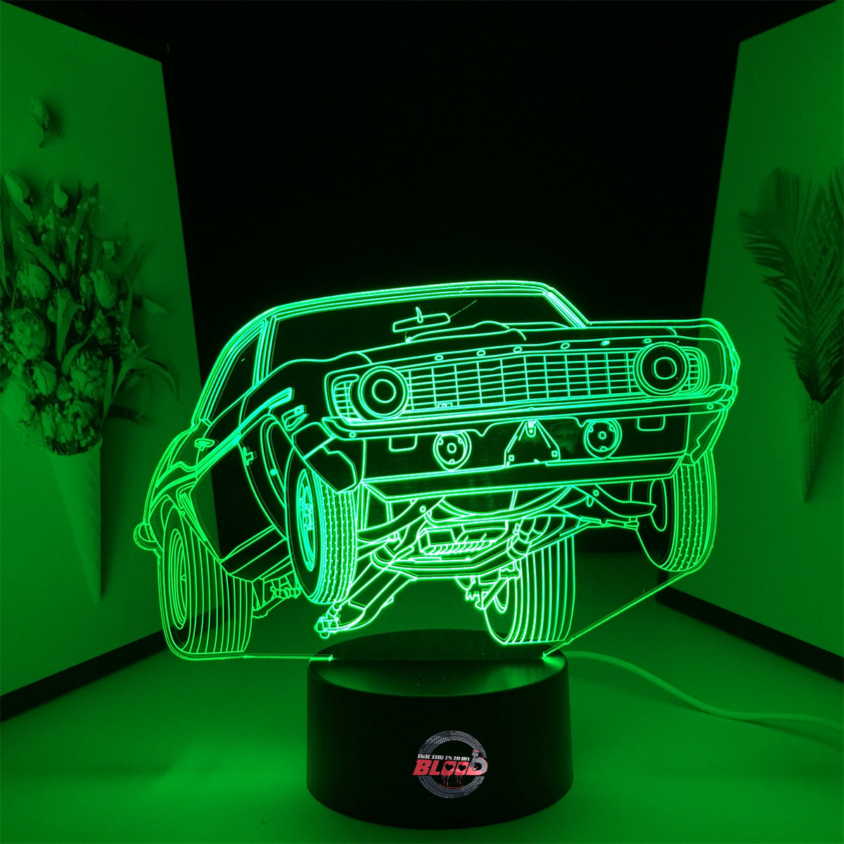 1969 Chevy Camaro LED Lamp featuring a classic drag racing wheels-up launch silhouette glowing in a vibrant red on a black base.