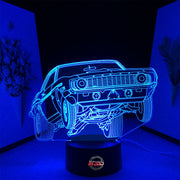 1969 Chevy Camaro LED Lamp featuring a classic drag racing wheels-up launch silhouette glowing in a vibrant red on a black base.