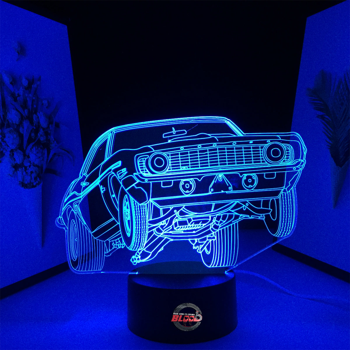 1969 Chevy Camaro LED Lamp featuring a classic drag racing wheels-up launch silhouette glowing in a vibrant red on a black base.