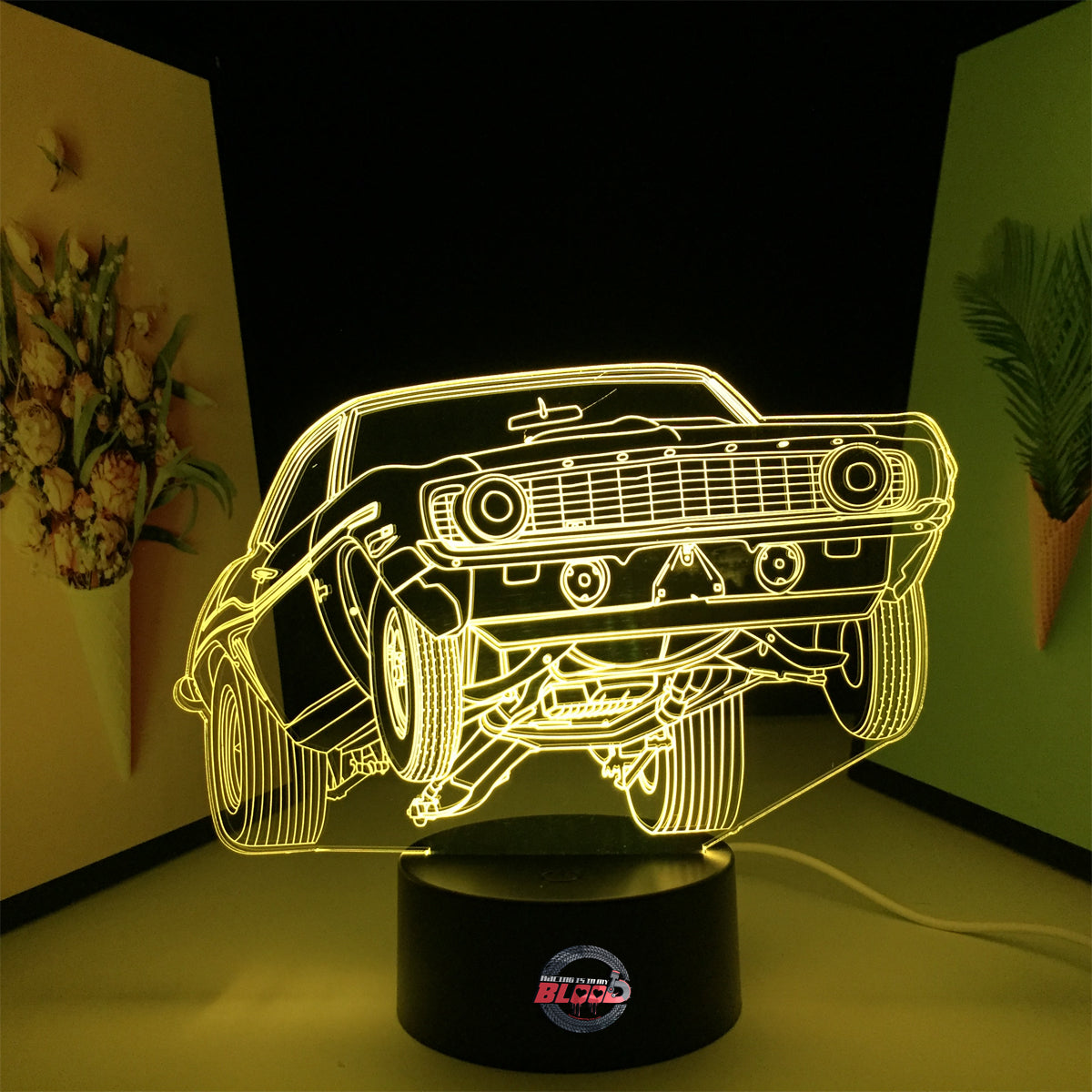 1969 Chevy Camaro LED Lamp featuring a classic drag racing wheels-up launch silhouette glowing in a vibrant red on a black base.