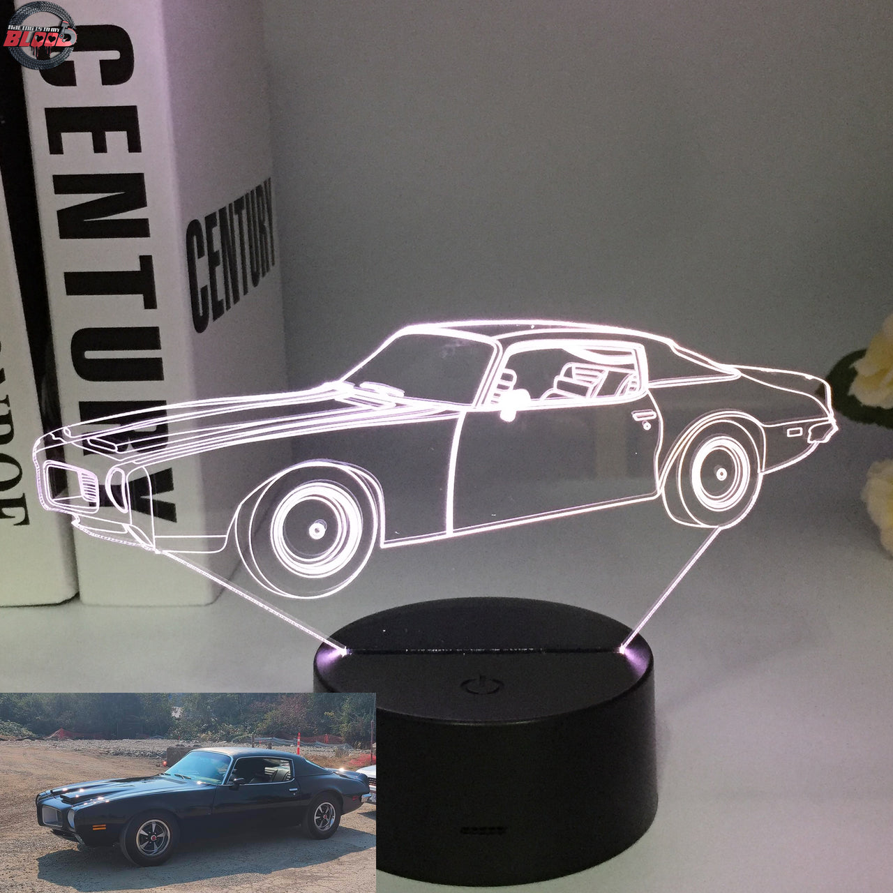 1970 Pontiac Firebird 3D LED Illusion Lamp displaying the classic second-generation silhouette in a vibrant red glow on a premium black base.