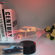 1970 Pontiac Firebird 3D LED Illusion Lamp displaying the classic second-generation silhouette in a vibrant red glow on a premium black base.