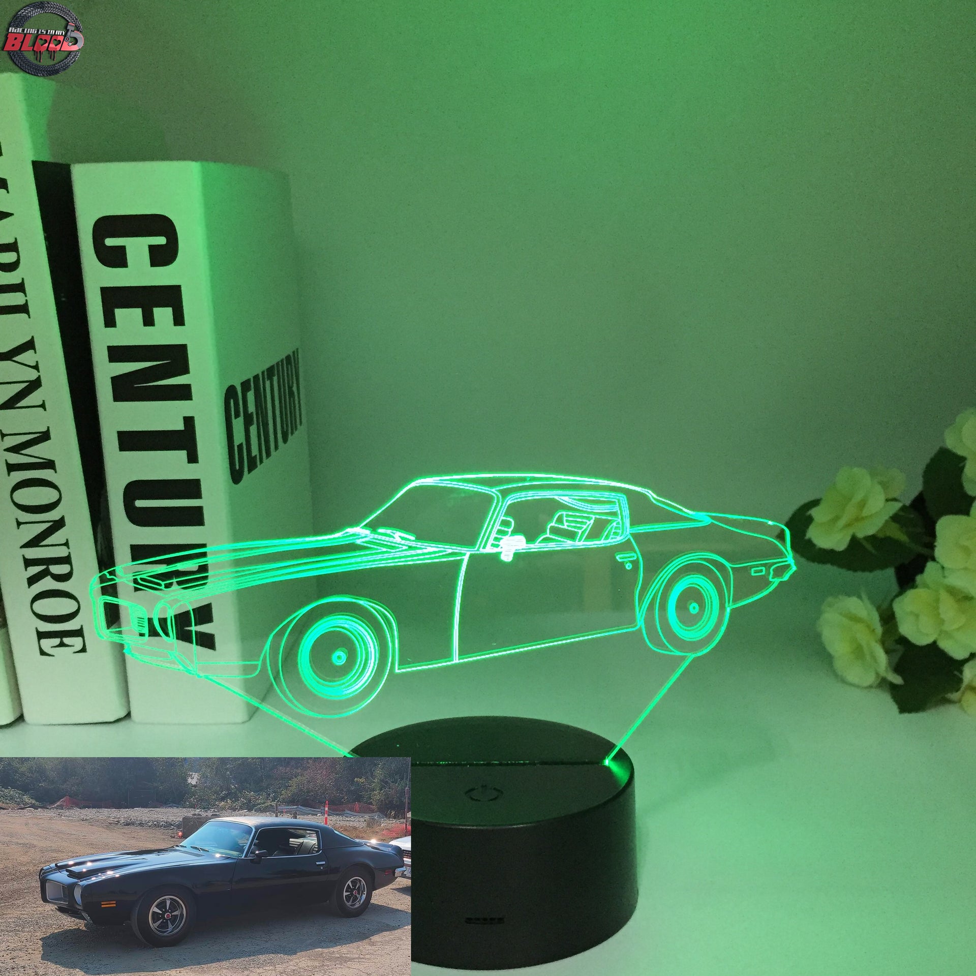 1970 Pontiac Firebird 3D LED Illusion Lamp displaying the classic second-generation silhouette in a vibrant red glow on a premium black base.