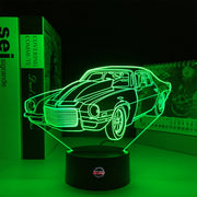 1970 Split Bumper Camaro LED Lamp showing the iconic front-end silhouette glowing in a vibrant lime green on a premium black base.