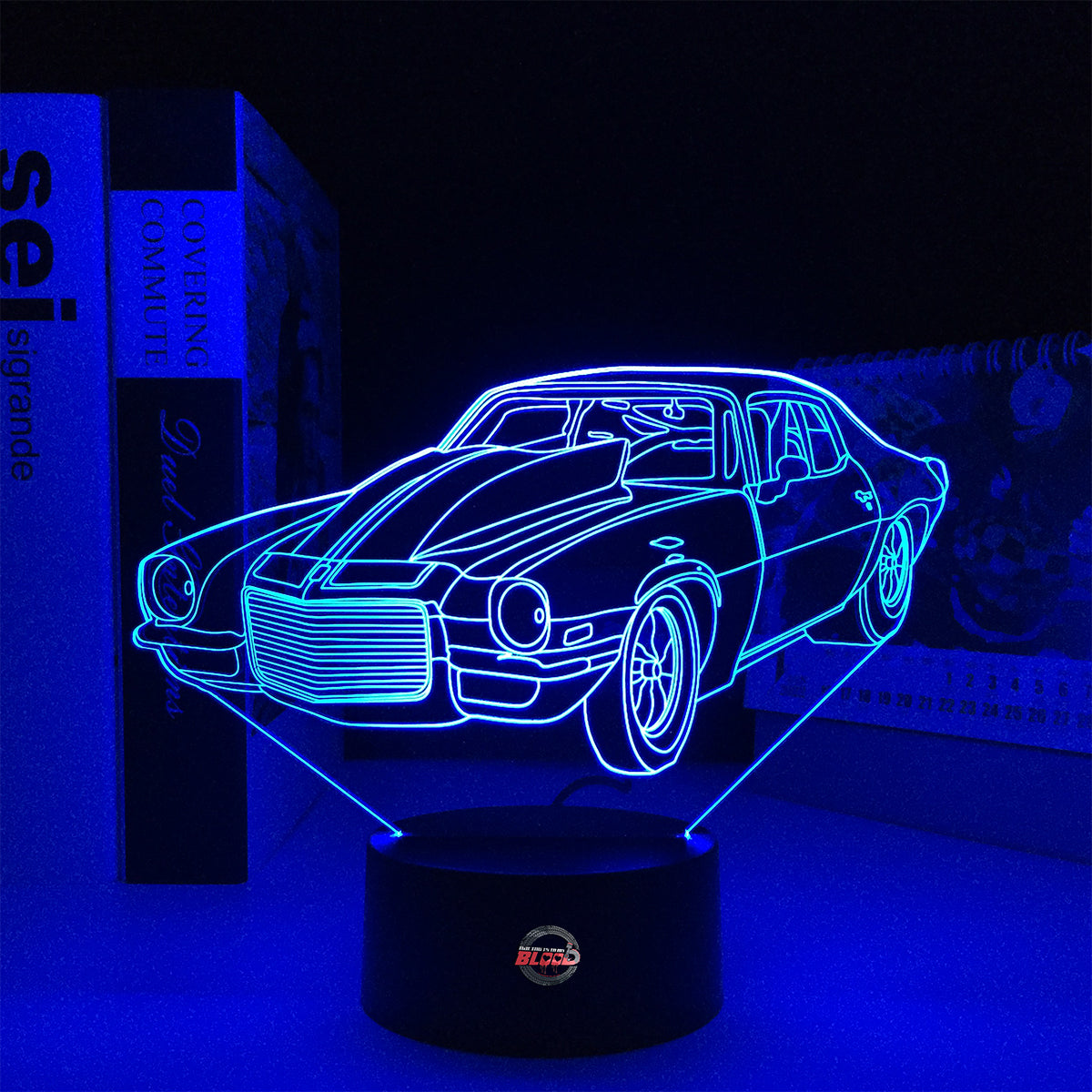 1970 Split Bumper Camaro LED Lamp showing the iconic front-end silhouette glowing in a vibrant lime green on a premium black base.