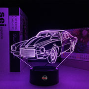 1970 Split Bumper Camaro LED Lamp showing the iconic front-end silhouette glowing in a vibrant lime green on a premium black base.