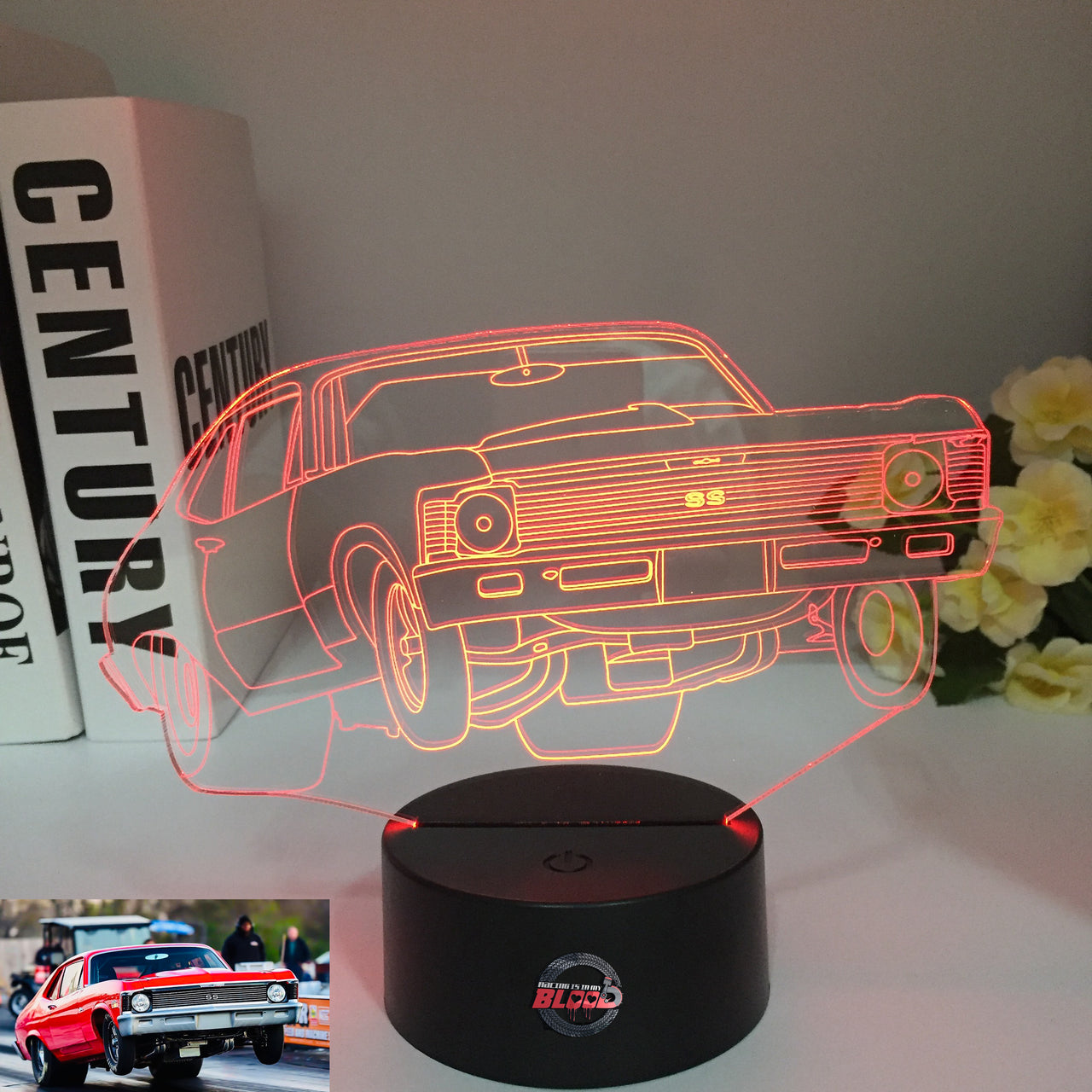 1972 Chevy Nova 3D LED Illusion Lamp displaying the classic muscle car silhouette in a vibrant red glow on a premium black base.