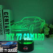 1977 Chevy Camaro 3D LED Illusion Lamp showing the classic second-generation silhouette in a vibrant yellow glow on a premium black base.