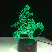ATV 3D LED Lamp showing a detailed quad silhouette glowing in a bright lime green on a modern black base.