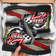 A pair of USA Drag Racing All-Season Boots featuring a bold, full-color drag racing design on high-quality water-resistant micro-suede with a heavy-duty black sole.