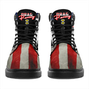 A pair of USA Drag Racing All-Season Boots featuring a bold, full-color drag racing design on high-quality water-resistant micro-suede with a heavy-duty black sole.