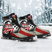 A pair of USA Drag Racing All-Season Boots featuring a bold, full-color drag racing design on high-quality water-resistant micro-suede with a heavy-duty black sole.