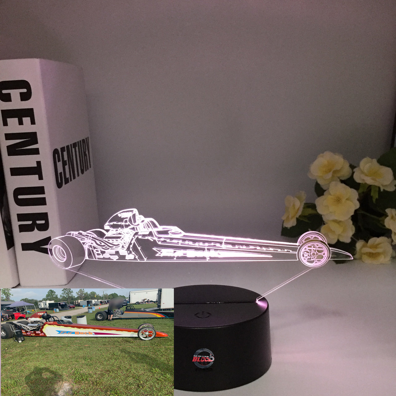 A personalized 3D LED Illusion Lamp featuring a custom-etched dragster design based on a user-provided photo, glowing in a vibrant blue on a black base.