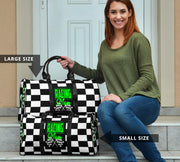 A stylish Racing Mom Travel Bag featuring a checkered flag pattern with the words "Racing Mom" and bright green accents, carried by a model.