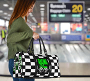 A stylish Racing Mom Travel Bag featuring a checkered flag pattern with the words "Racing Mom" and bright green accents, carried by a model.