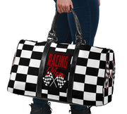 A stylish Racing Mom Travel Bag featuring a checkered flag pattern with the words "Racing Mom" and vibrant red accents, carried by a model.