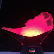 Airboat 3D LED Lamp featuring a detailed fan boat silhouette glowing in a vibrant swamp green on a premium black base.