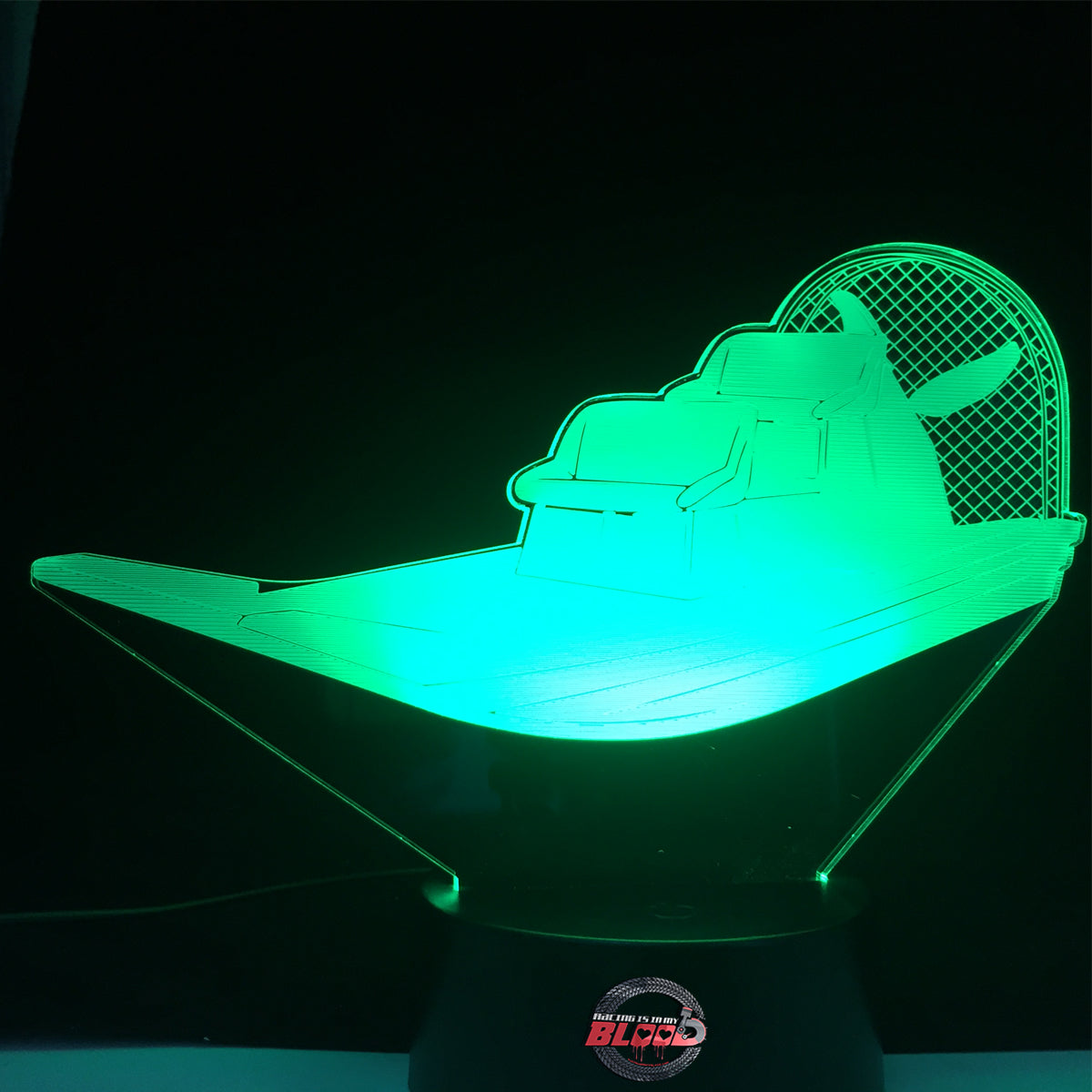 Airboat 3D LED Lamp featuring a detailed fan boat silhouette glowing in a vibrant swamp green on a premium black base.