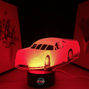 Asphalt Late Model LED Lamp featuring a sleek short track racing car silhouette glowing in a vibrant blue on a premium black base.