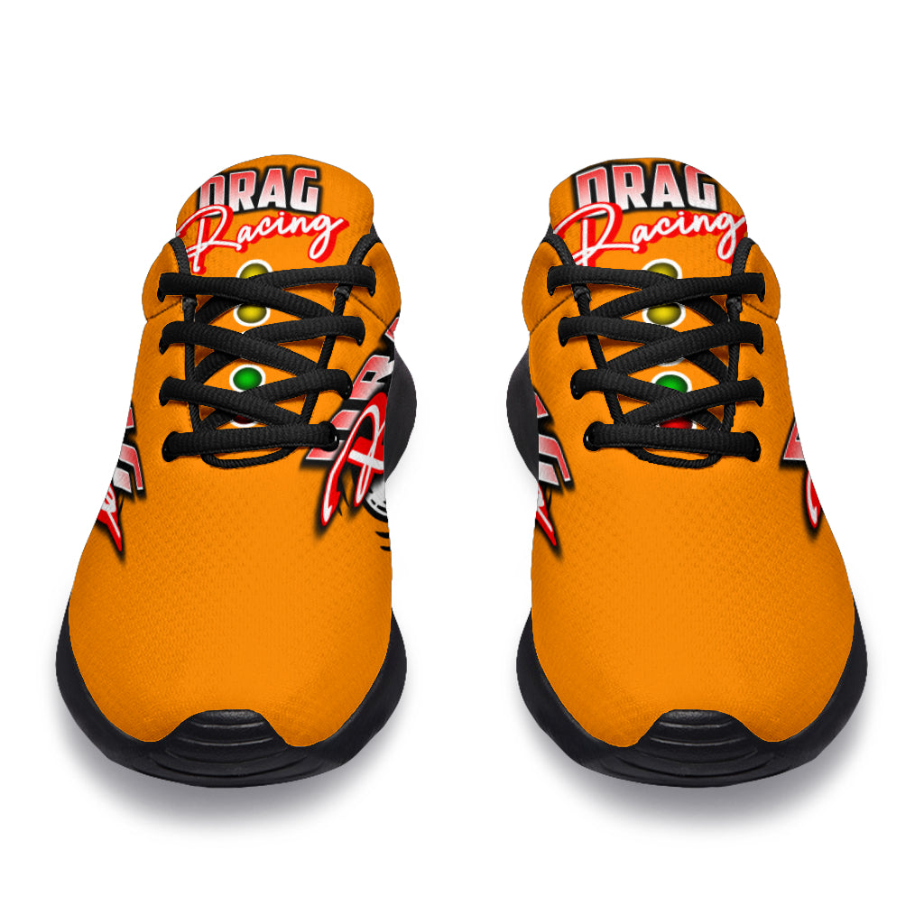 Bright orange drag racing sneakers with high-traction EVA outsoles.