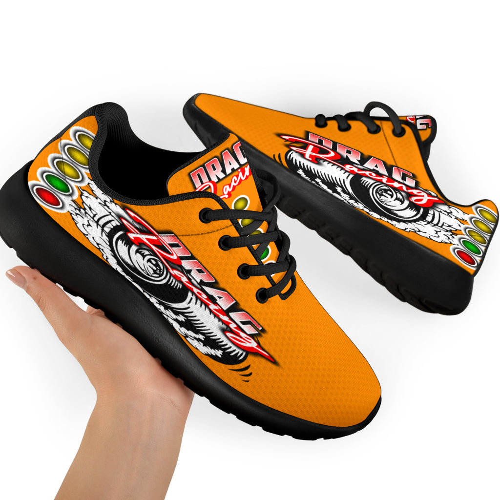 Bright orange drag racing sneakers with high-traction EVA outsoles.