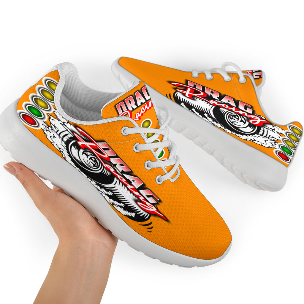 Bright orange drag racing sneakers with high-traction EVA outsoles.